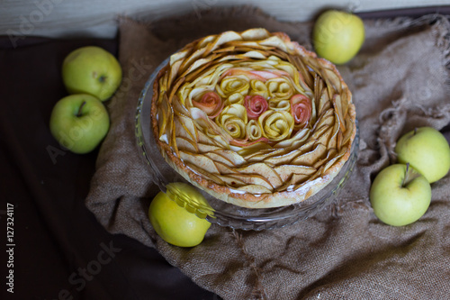 Apple homemade cake in the form of beautiful roses cofee yellow