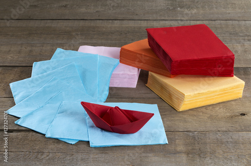 Paper napkins and paper boat