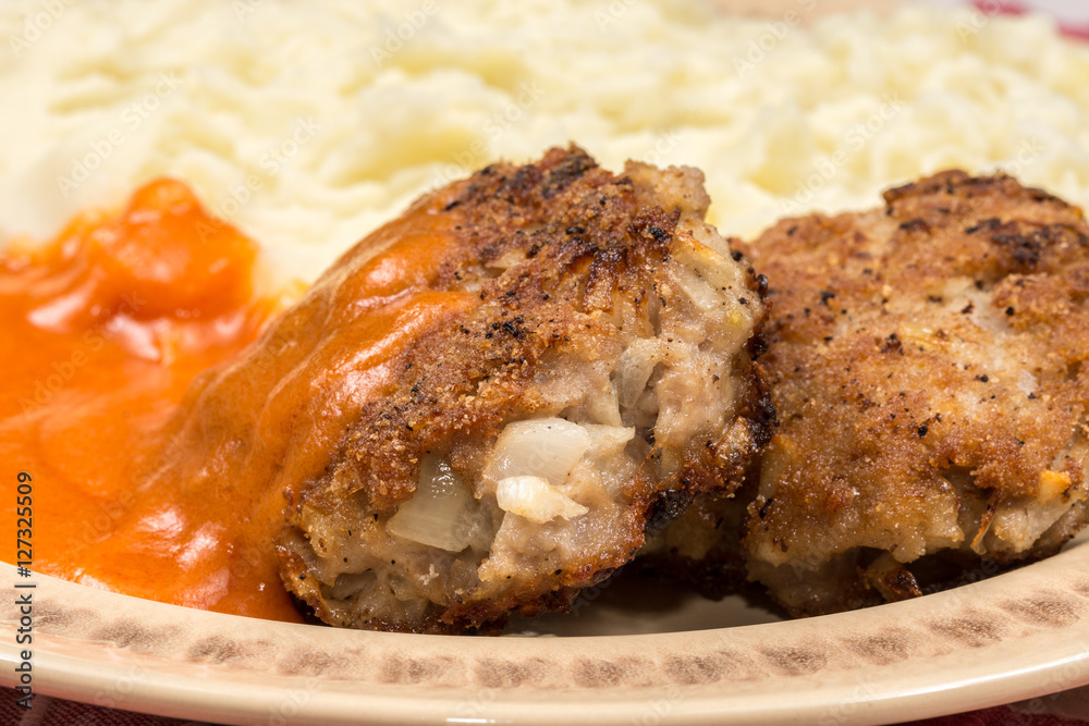 Minced meat meatballs with tomato sauce on the plate Minced meat meatballs with tomato sauce on the plate