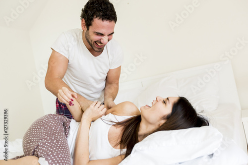 Couple having fun in bed