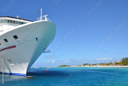 looking past the bow of a passenger ship towards the beach on Grand Turk Island