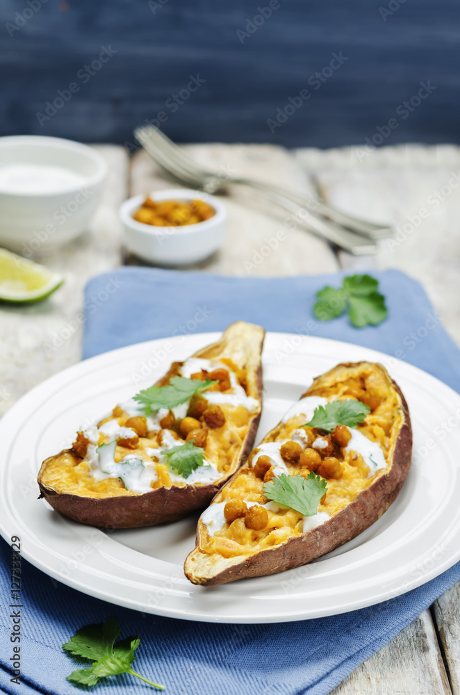 Roasted chickpeas stuffed sweet potato with Greek yogurt cilantr Roasted chickpeas stuffed sweet potato with Greek yogurt cilantr