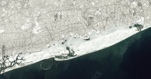 High-altitude overflight aerial of Long Island. Clip loops and is reversible. Elements of this image furnished by NASA  photo