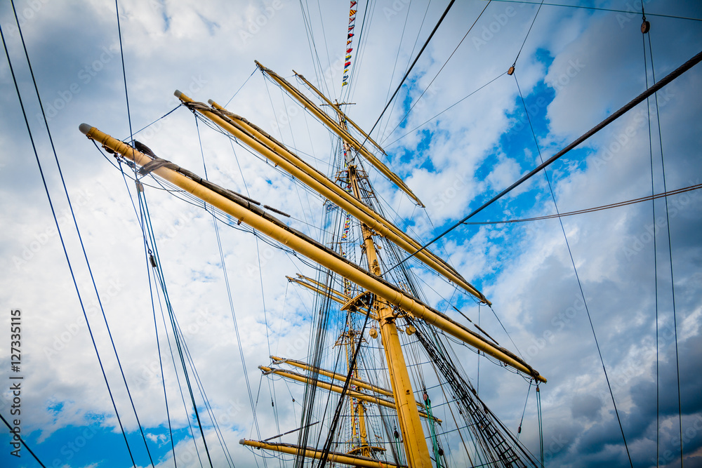 Detail of a sailboat rigging. Mast on traditional sailboats. Ma Detail of a sailboat rigging. Mast on traditional sailboats. Ma