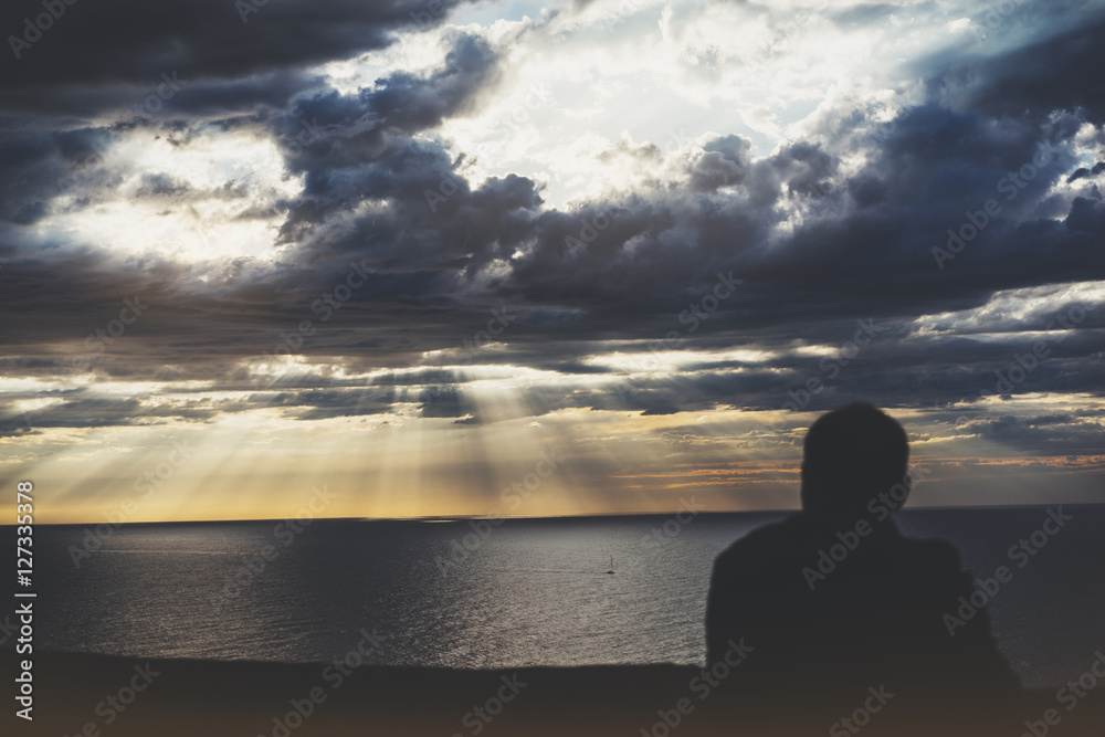 Clouds blue sky and sunlight sunset on horizon ocean Basque Country. Outline looking travel hipster on background seascape dramatic rays sunrise. Relax view waves sea, mockup nature concept. Clouds blue sky and sunlight sunset on horizon ocean Basque Country. Outline looking travel hipster on background seascape dramatic rays sunrise. Relax view waves sea, mockup nature concept.