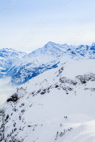 Winter snow covered mountain peaks in Europe. The Alps winter mo © EwaStudio