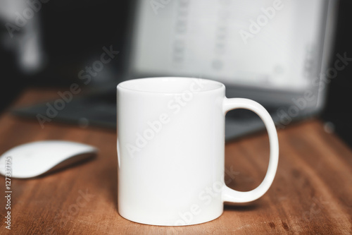 Fotografie, Obraz White mug on the desktop