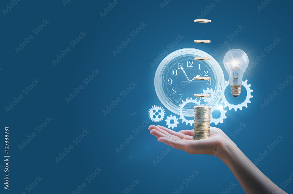 Fototapeta premium Business woman in the hand of a clock gears money and the lamp symbolizes the effective implementation of business ideas