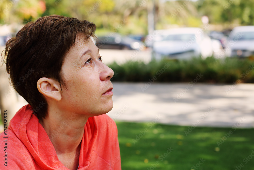 Portrait of beautiful 45 years old woman outdoors Portrait of beautiful 45 years old woman outdoors