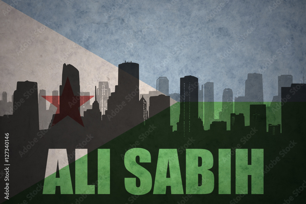abstract silhouette of the city with text Ali Sabih at the vintage djibouti flag