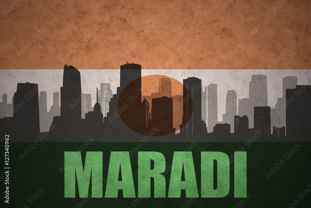 abstract silhouette of the city with text Maradi at the vintage niger flag