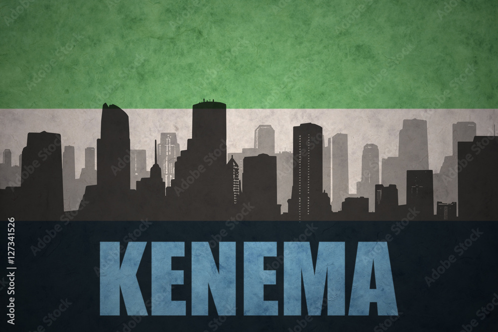 abstract silhouette of the city with text Kenema at the vintage sierra leone flag