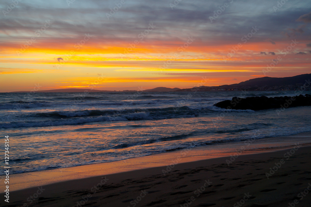 Sunset in Majorca. Coast background.
Sunset in Majorca. Coast background.