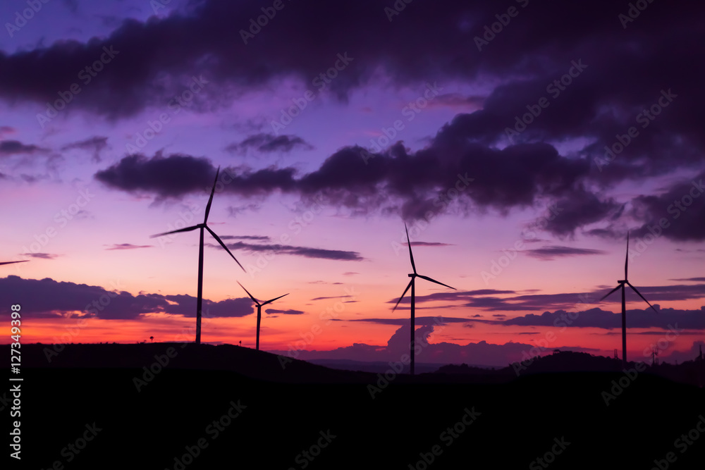 Obraz premium wind turbine sunset time