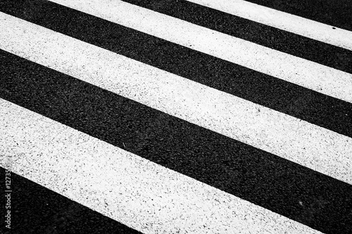 Parking lot white stripes on black asphalt
