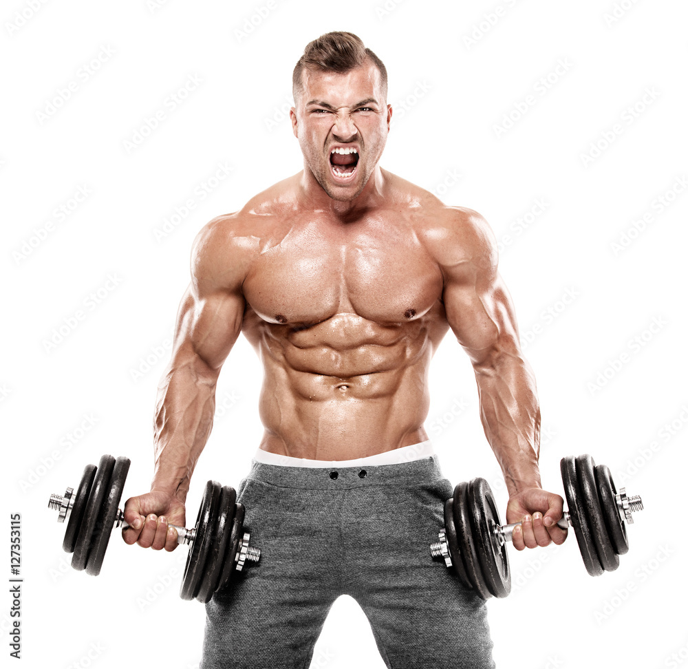 Muscular bodybuilder guy doing exercises with dumbbell