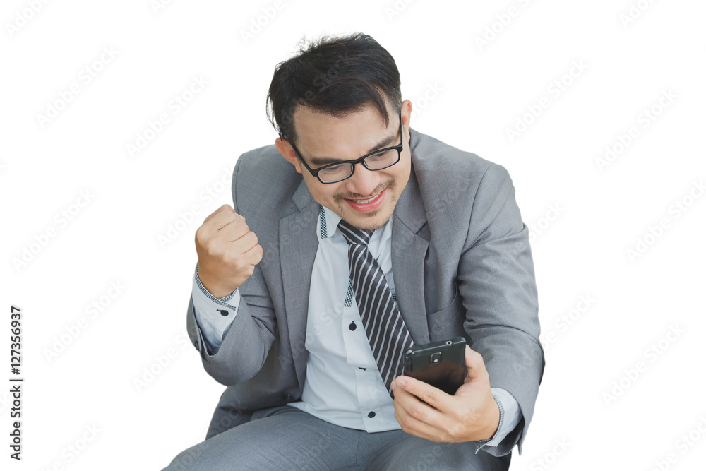 Businessman happy smiling, wearing suit and using modern smartph Businessman happy smiling, wearing suit and using modern smartph