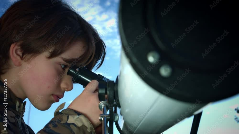 4k Technology and Astrology Child with Telescope Exploring the Sky 4k Technology and Astrology Child with Telescope Exploring the Sky