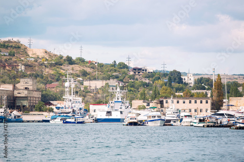 Motor boats and sailboats in harbor