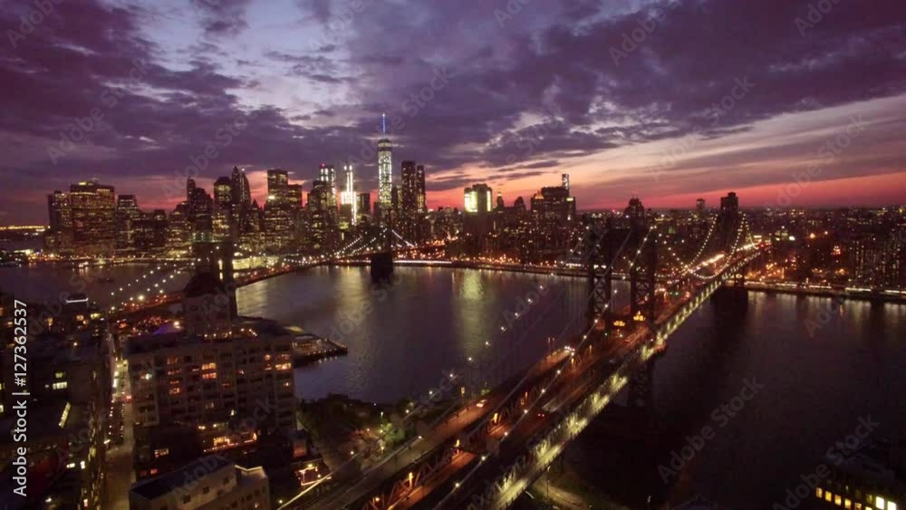 descending view of Manhattan over bridge