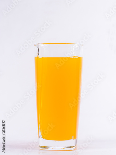 Orange juice in the glasses white background