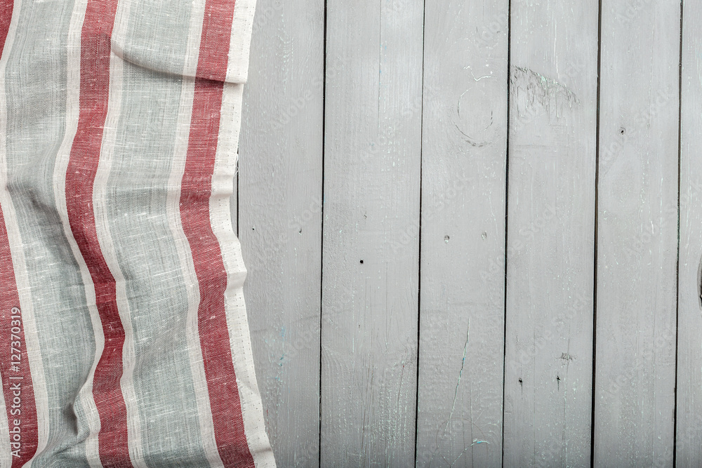 Tablecloth textile on wooden background Tablecloth textile on wooden background