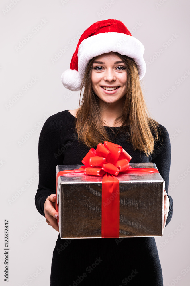 Portrait happy woman with gift box in hands. Portrait happy woman with gift box in hands.