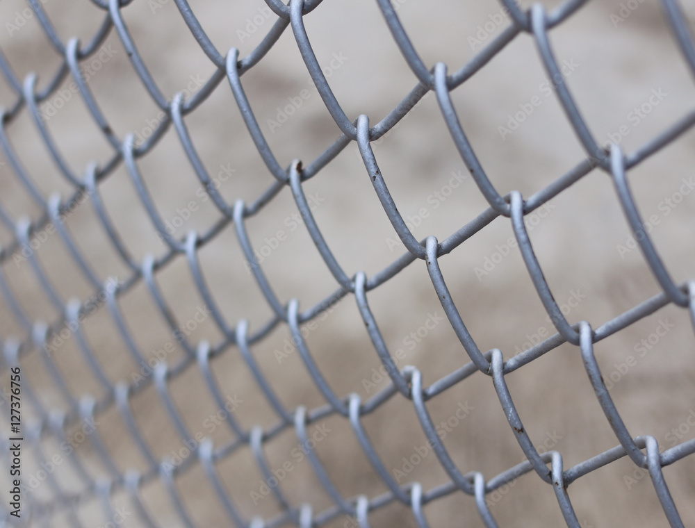 Fototapeta premium metal fence with concrete background