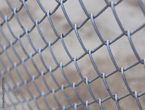 metal fence with concrete background