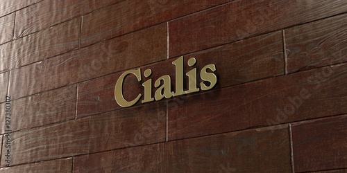 Cialis - Bronze plaque mounted on maple wood wall  - 3D rendered royalty free stock picture. This image can be used for an online website banner ad or a print postcard. photo