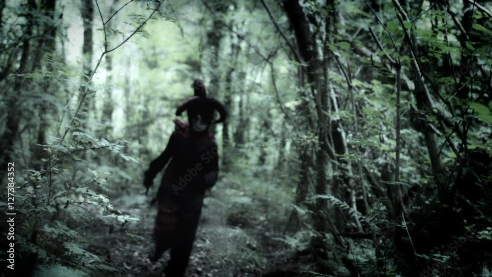 4k Halloween Shot of a Child in Joker Costume Running to Camera 4k Halloween Shot of a Child in Joker Costume Running to Camera