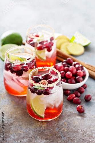 Cold winter cocktail with cranberry and lime