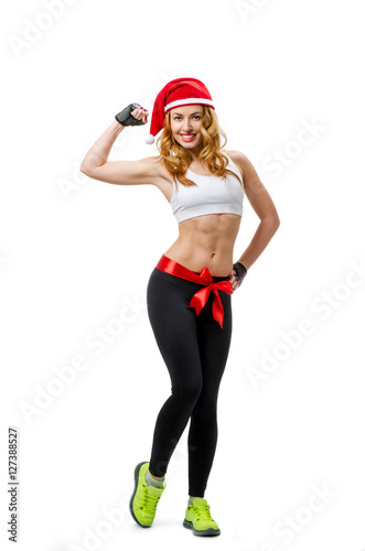 Santa hat Christmas woman tied with red bow showing biceps.