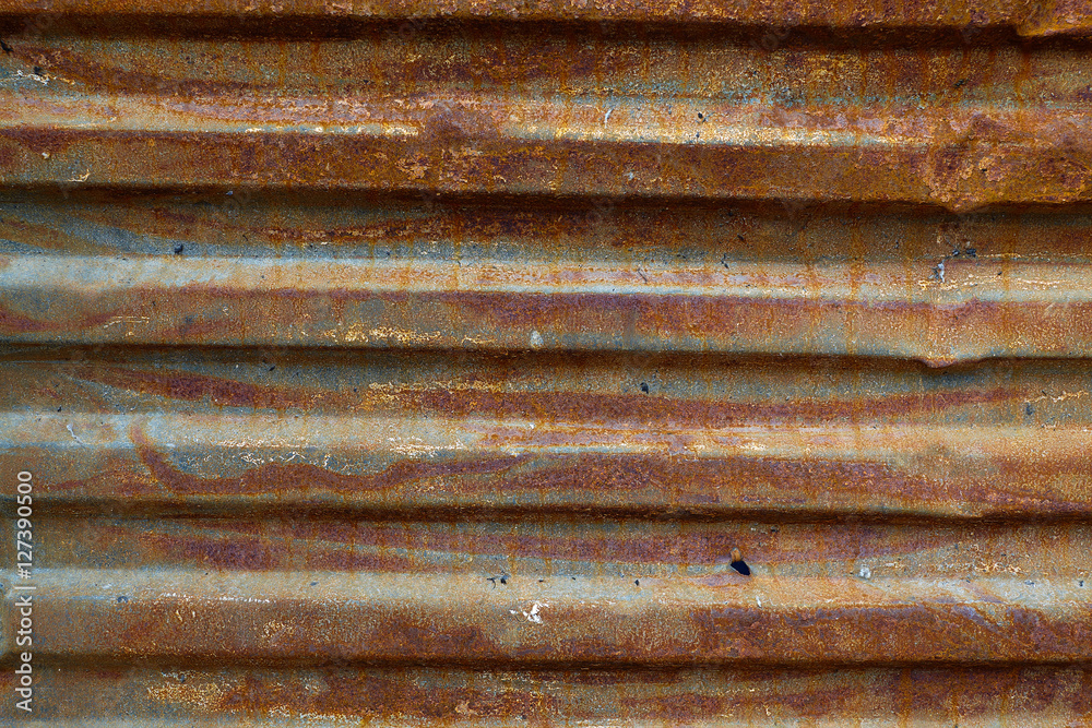 Rusty corrugated fence - stock image