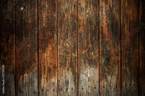 Grungy cracked wooden plank textured background