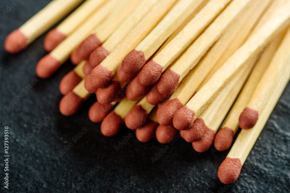 Household safety matches on dark background. Household safety matches on dark background.