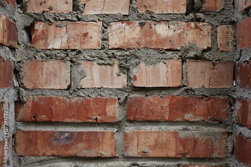 Red brick wall close-up