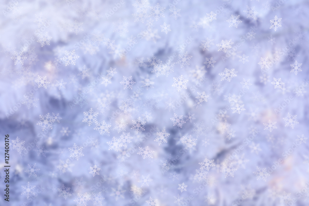 Abstract winter background with snow flakes falling.