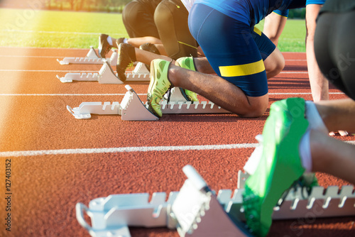 Feet on starting block ready for a spring start.