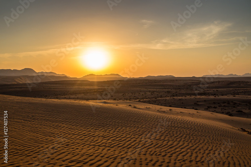 Sunset over the Wahiba Sands desert  Oman.