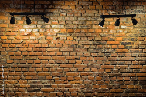 Old brick wall with stage lights