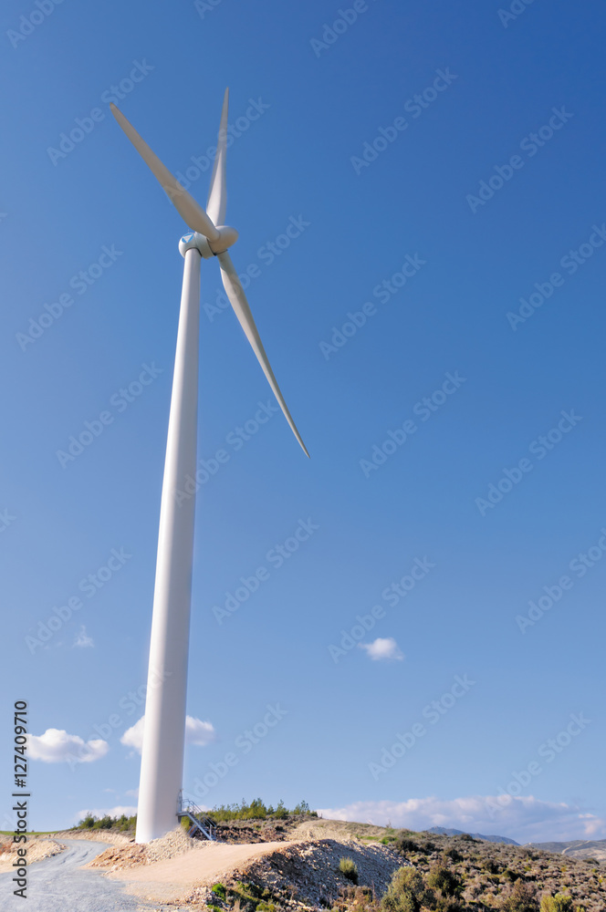 Huge windmill station with blue sky background Huge windmill station with blue sky background