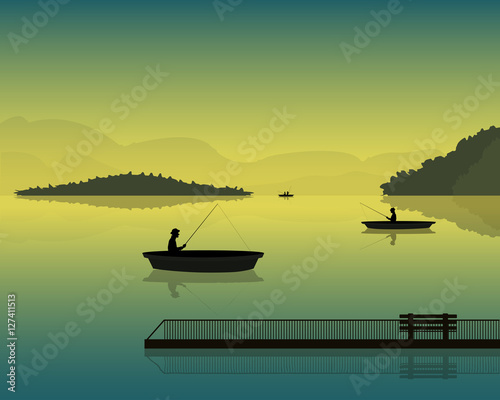 landscape with the silhouette of fishermen in a boat at sunset, mountains and forests