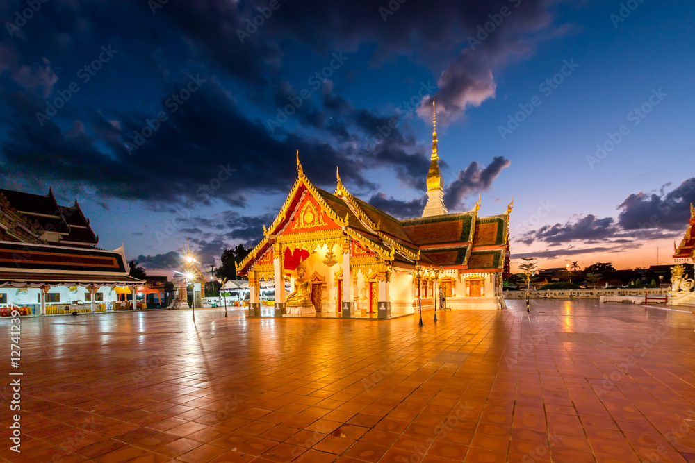 Beautiful sunset in Wat Pratat Choeng Chum at Sakon Nakhon Province, Thailand.Landmark of thailand. Beautiful sunset in Wat Pratat Choeng Chum at Sakon Nakhon Province, Thailand.Landmark of thailand.