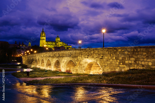 Salamanca sunset in roman bridge Tormes river