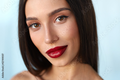 Woman With Beauty Face And Beautiful Makeup And Sexy Red Lips