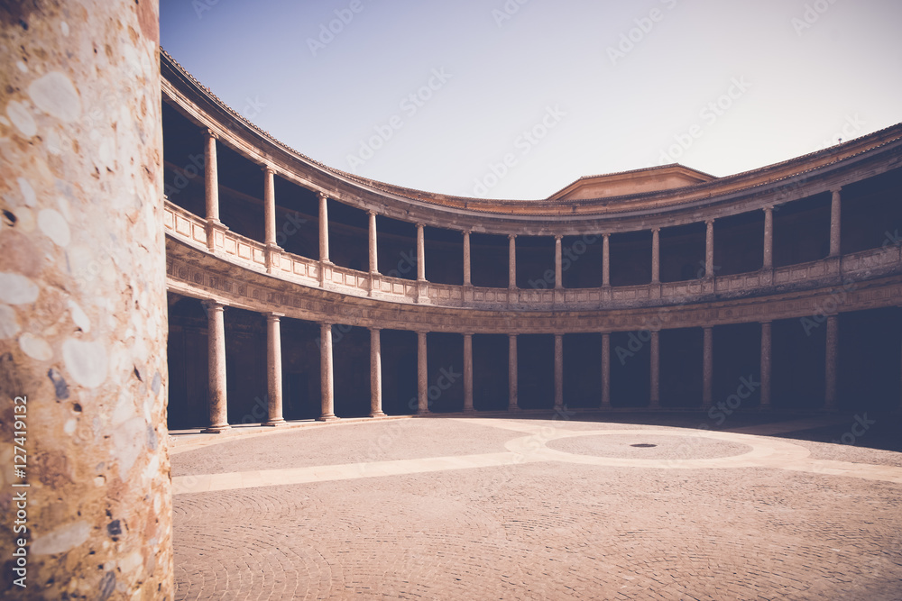 Fototapeta premium The columned courtyard at the Palace of Charles V, Alhambra in G
