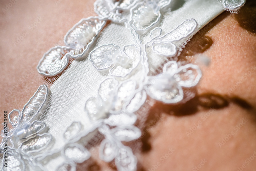 Details from the bride wedding dress and accessories Details from the bride wedding dress and accessories