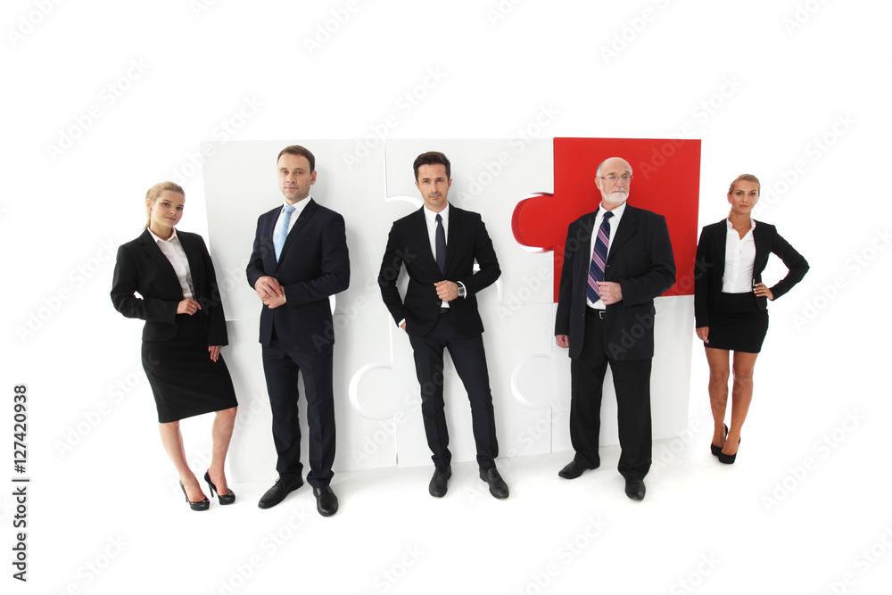 Business people and puzzle