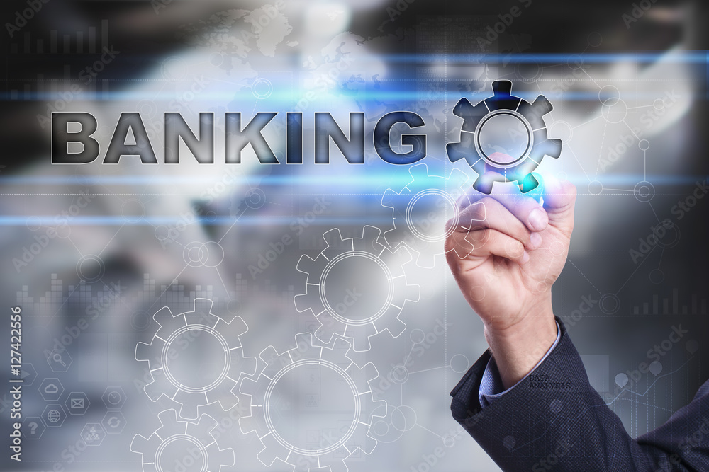 Businessman is drawing on virtual screen. banking concept Businessman is drawing on virtual screen. banking concept